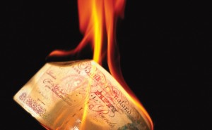 fifty-pound-note-on-fire-580x358