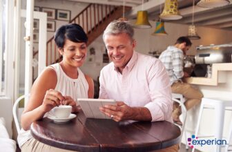 Experian_Simple savings to clear your clutter - couple in coffee shop