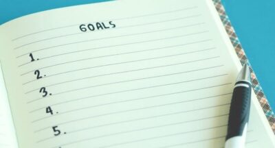 List of goals on a note pad