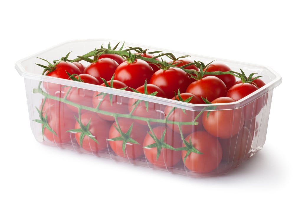 Cherry tomatoes in plastic tub