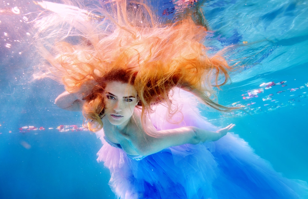 Professional mermaid underwater