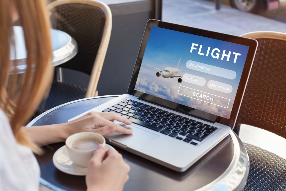 Woman booking flights online