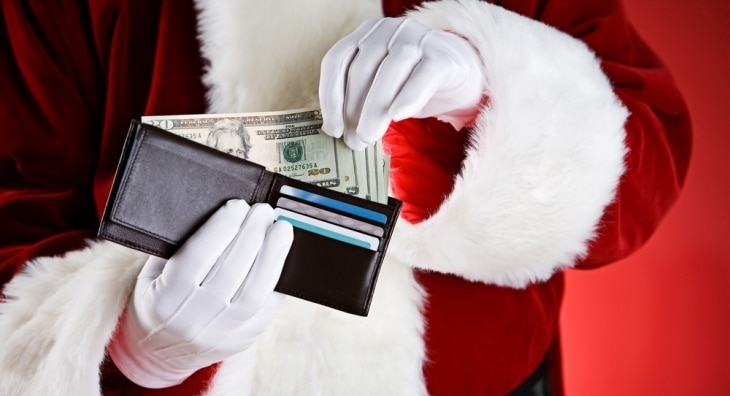 Santa with money in his wallet