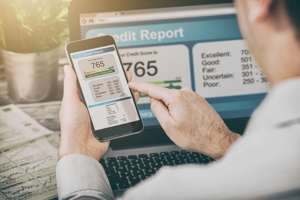 Credit report on phone and laptop