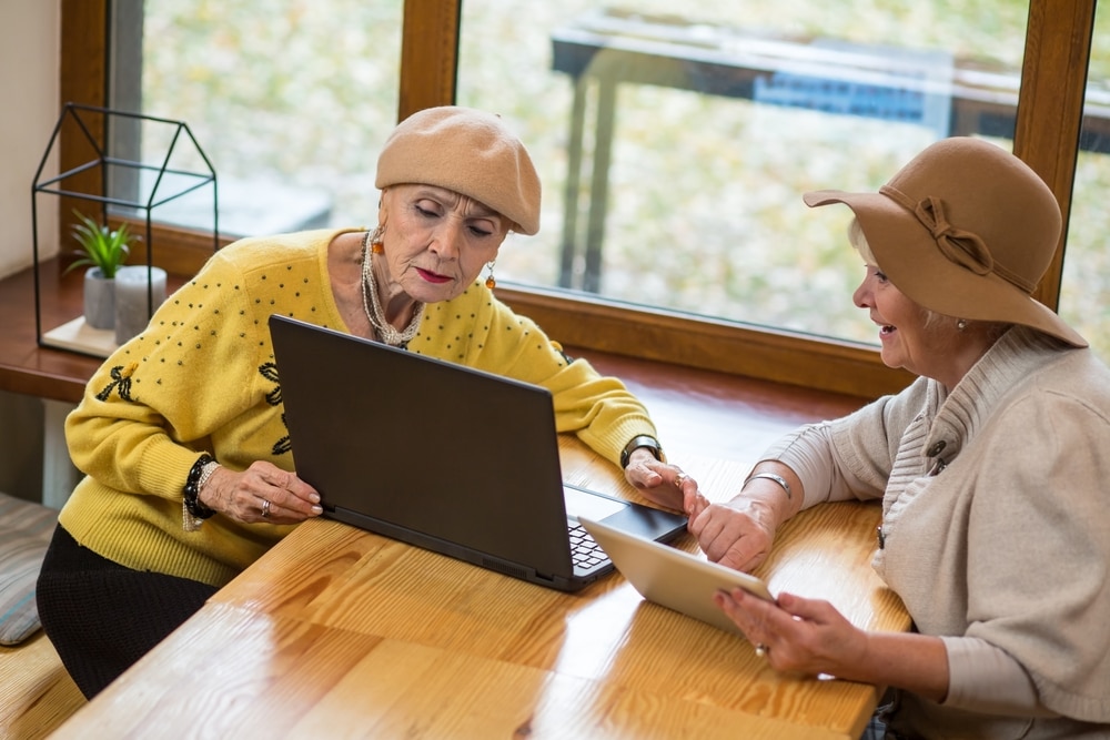 Elderly women using laptop