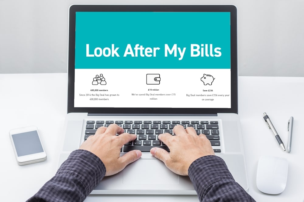 Look After My Bills Website on Laptop