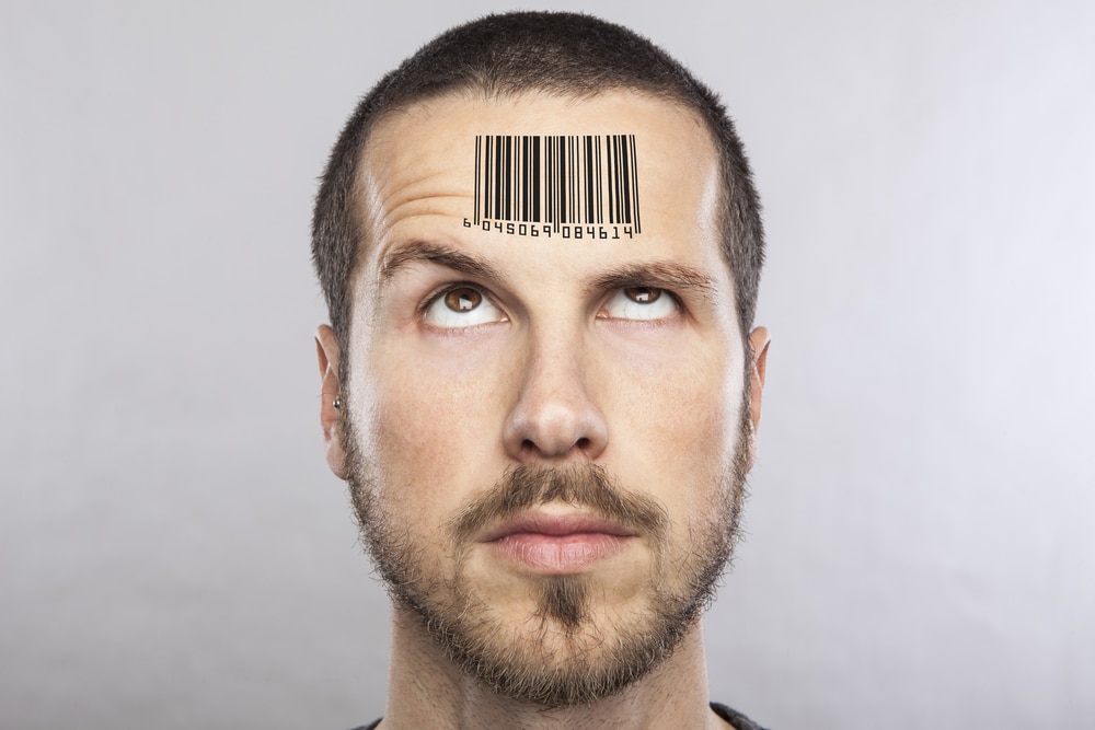 Man with barcode on his head