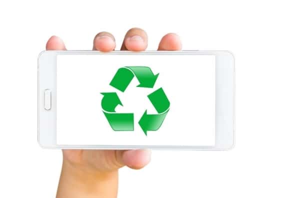 Mobile smartphone with a recycling symbol on the screen