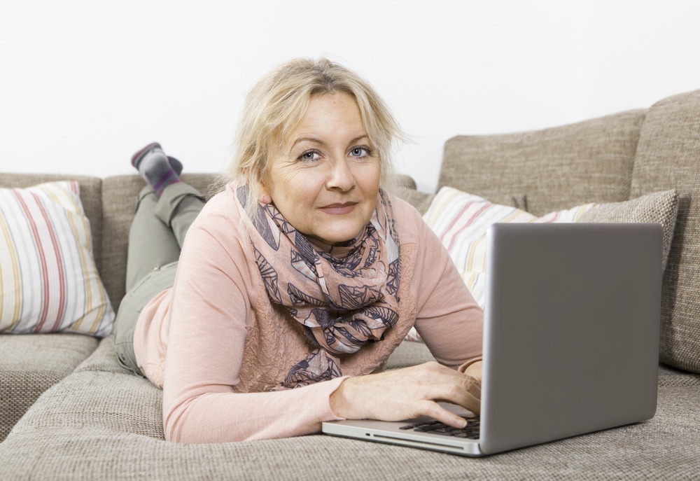 Older woman using laptop