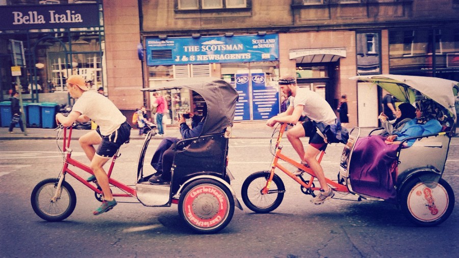 two pedicab drivers in the uk