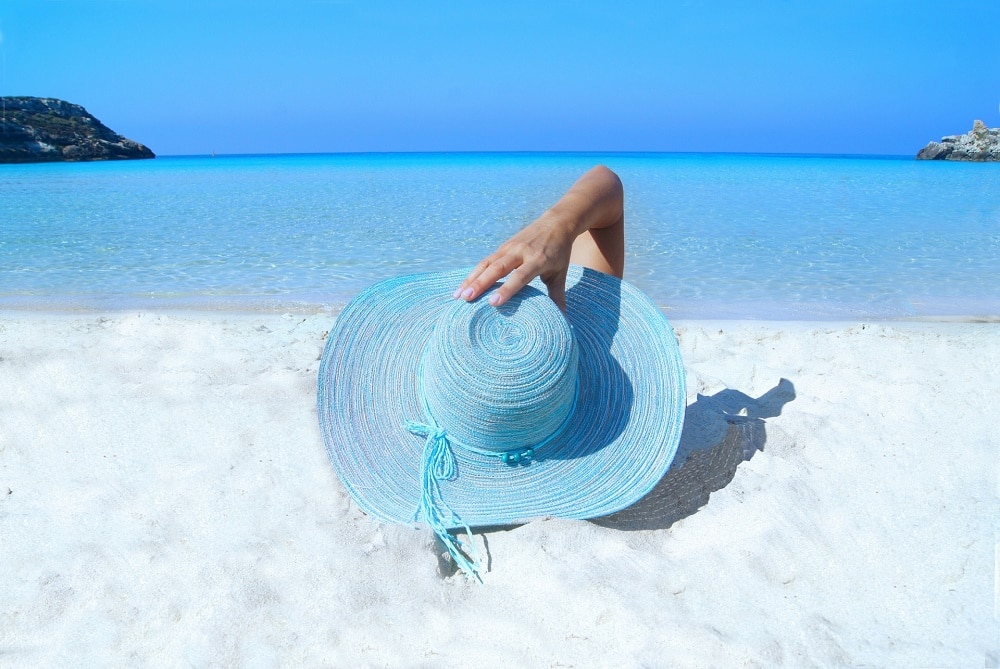 MoneyMagpie_Relax-Beach-Hat-Holiday-Woman