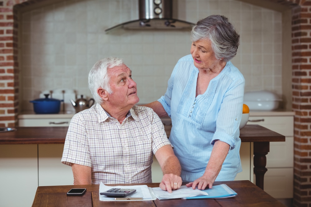 Senior couple discussing finances