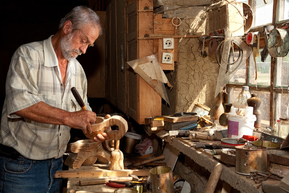 Carpenter working in his shed