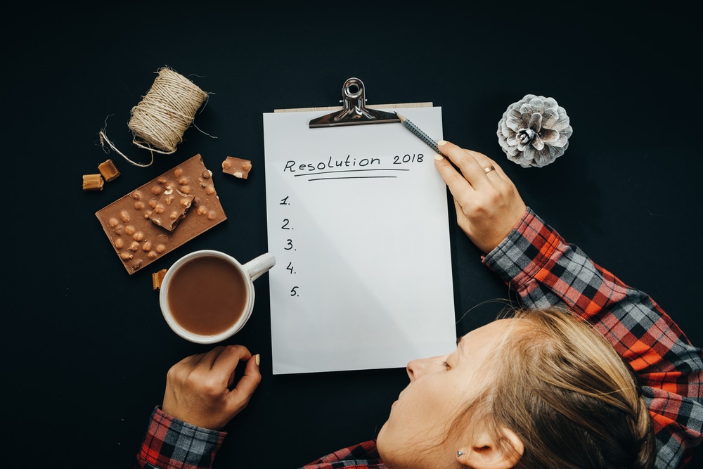 Woman trying to think of new years resolutions