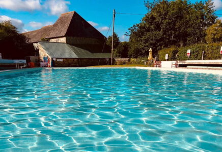 Chagford Pool in Devon surrounded by beautiful countryside.